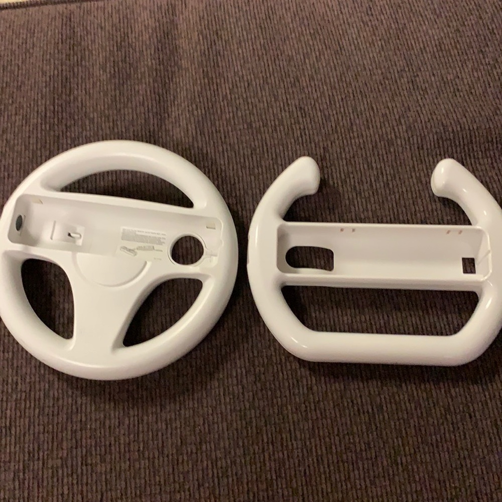 2 Wii/Wii U racing wheels one is OEM the othe is aftermarket